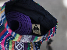 The Wild Guru yoga mat bag. Colorful geometric design. Insert pocket. 100% cotton. Adjustable strap.