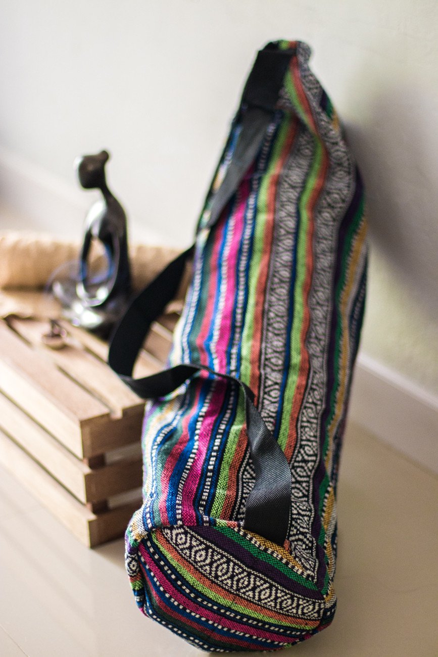 The Wild Guru yoga mat bag. Colorful geometric design. 100% cotton. Adjustable strap.