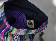 The Wild Guru yoga mat bag. Colorful geometric design. Insert pocket. 100% cotton. Adjustable strap. 